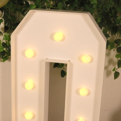 Light-up marquee letter "O" with glowing bulbs, ideal for decorations.