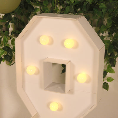 Octagonal light fixture with six bulbs, designed for a modern decor.
