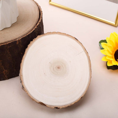 Natural wood slice for decorative use on a table setting.