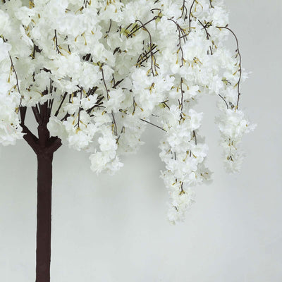 Artificial white cherry blossom tree with detailed branches and flowers