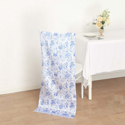 Floral patterned chair cover draped over a white chair in a dining setting.