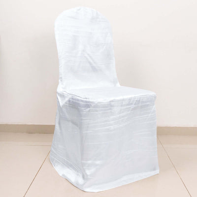 White chair cover draped on a chair for events and decoration.