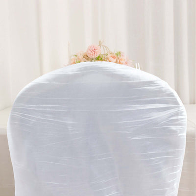 White chair cover draped elegantly for event decor