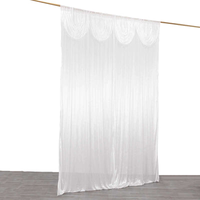 White sheer curtain draped elegantly on a wooden rod