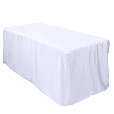 White tablecloth draped over a rectangular table