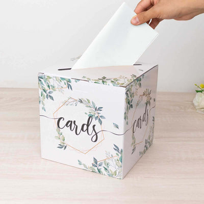 Decorative card box with floral design for events, being used to collect cards.