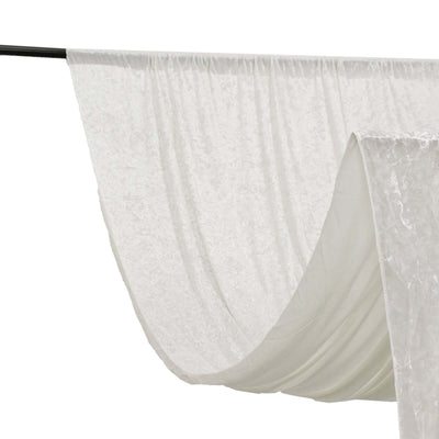 White fabric draped elegantly on a rod, showcasing soft texture and flow.