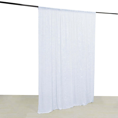 White sheer curtain hanging on a rod, showcasing its full length and drape.
