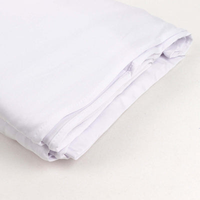 Folded white fabric sheet on a plain background.