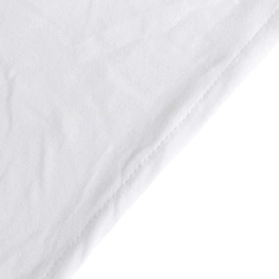 White fabric texture with visible creases and stitching details.