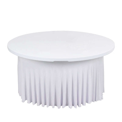 Round white table with a pleated white tablecloth