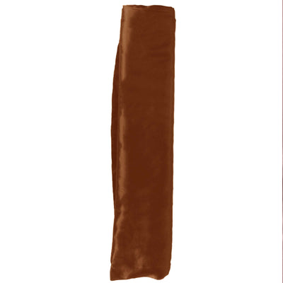 Brown velvet fabric roll on white background