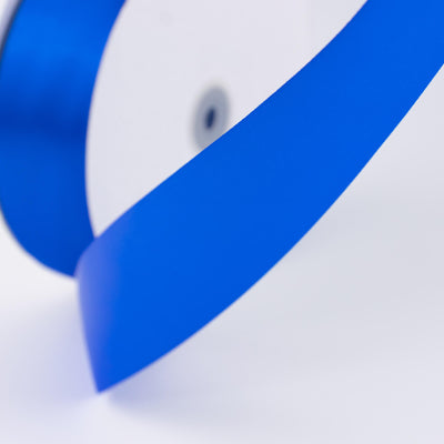 Abstract blue and white 3D ribbon design close-up