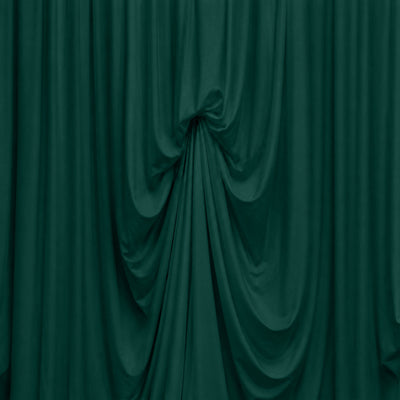 Abstract emerald green draped fabric texture background