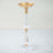 Elegant gold and crystal candle holder on a plain background