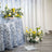 Acrylic flower stand with yellow and white floral arrangements.
