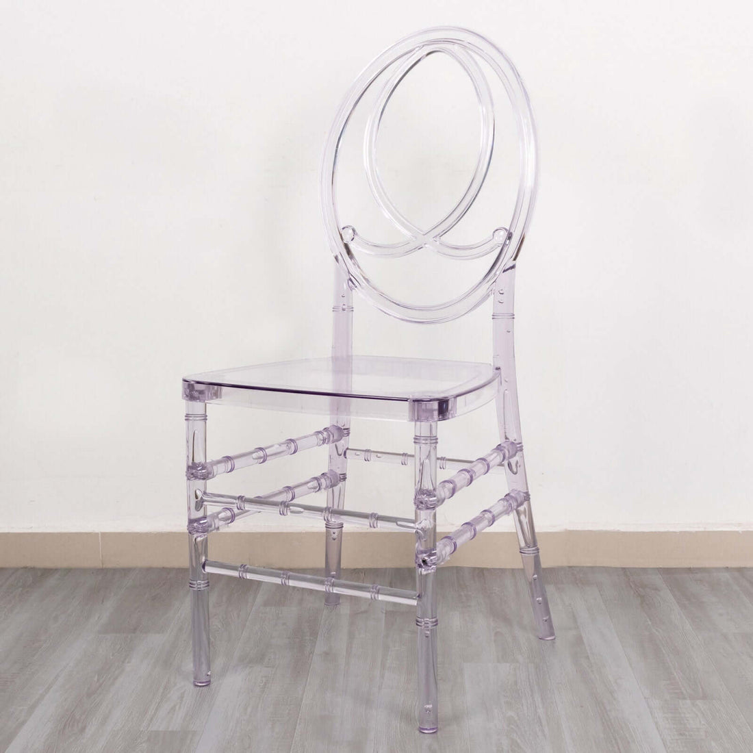 Clear acrylic chair with circular backrest, modern design.