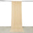 Beige fabric drape hanging from a rod, creating a smooth vertical flow.