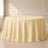Beige seamless finish round tablecloth for elegant dining settings.