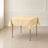 beige polyester square tablecloth on a table