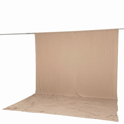 Beige seamless photography backdrop with floor sweep on support rod