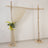 Wooden arch with draped fabric and floral arrangement