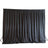 Black photography backdrop with draped fabric for photo shoots.