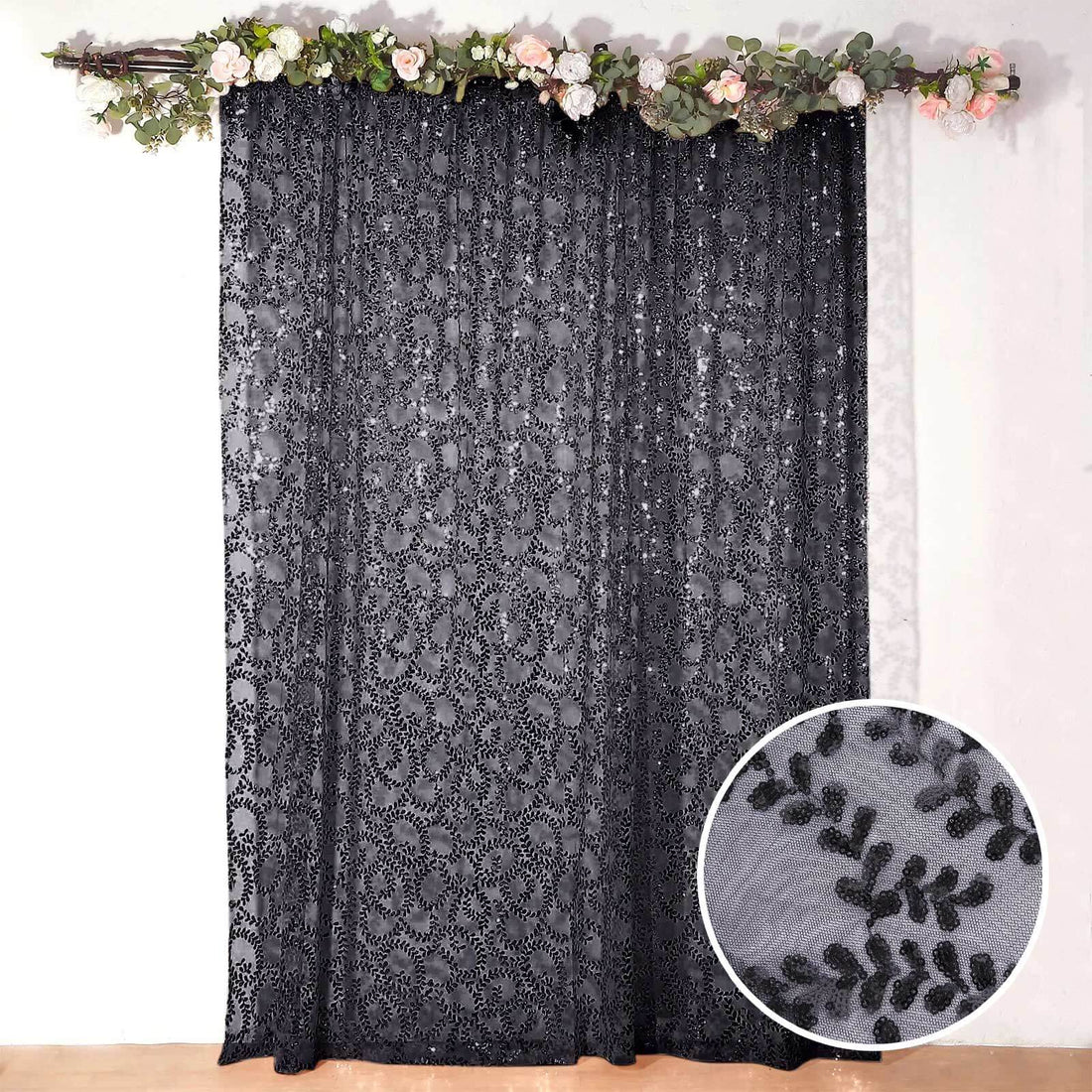 Black lace curtain with floral pattern and close-up texture detail.