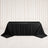 Black jacquard rectangular tablecloth draped over banquet table on white backdrop