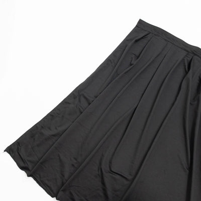Black pleated midi skirt on white background#whtbkgd