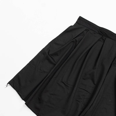 Black pleated skirt on white background, minimalist fashion product photo#whtbkgd