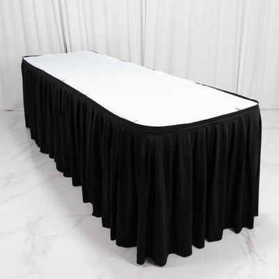 Black round banquet table skirt cover with white tabletop overlay on display