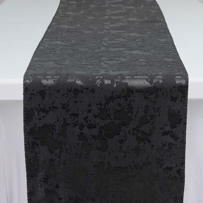 Black textured fabric table runner on white background