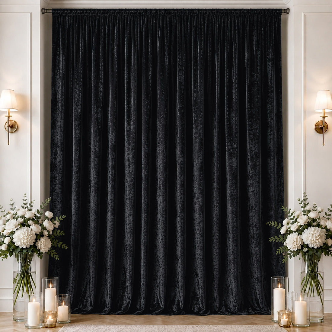 Black velvet blackout curtain in elegant room with floral decor and candles