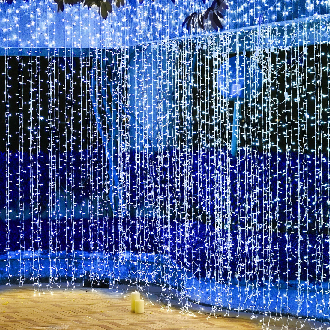String lights creating a magical ambiance in blue and white hues.