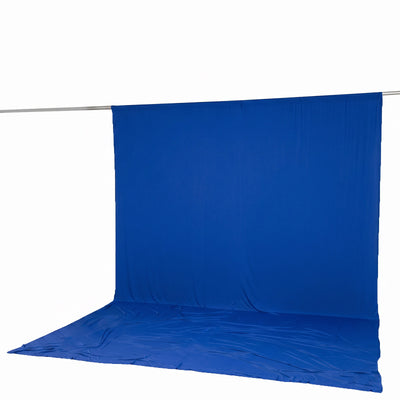 Blue photography backdrop with seamless floor and hanging support rod