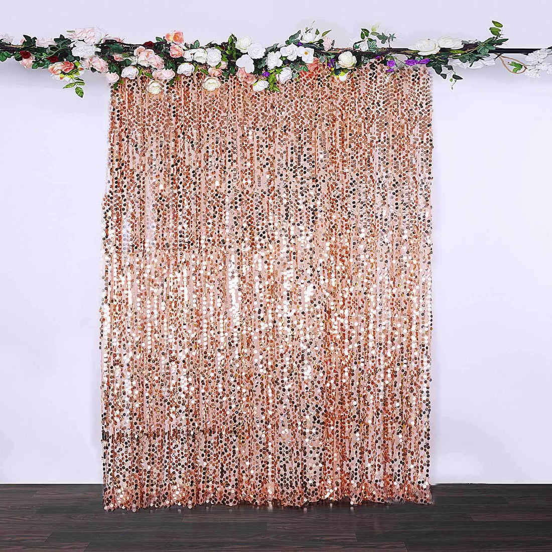 Rose gold sequin backdrop for events and photo shoots.