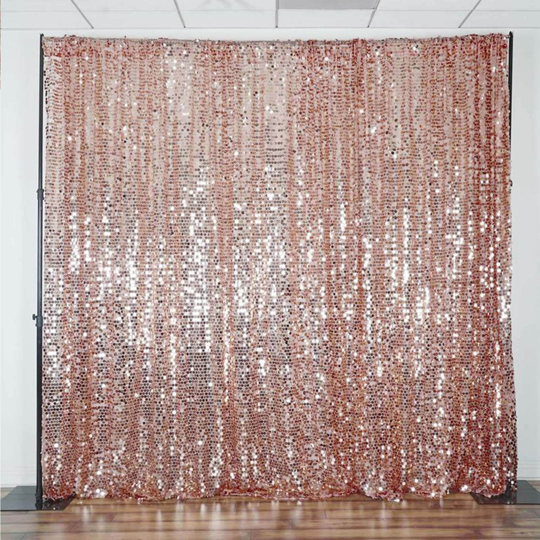 Rose gold sequin backdrop for events and photo shoots.