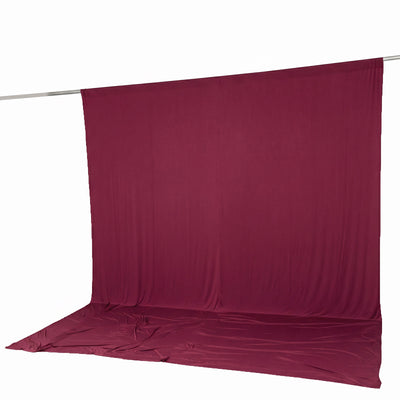 Burgundy fabric backdrop with floor drape on crossbar stand