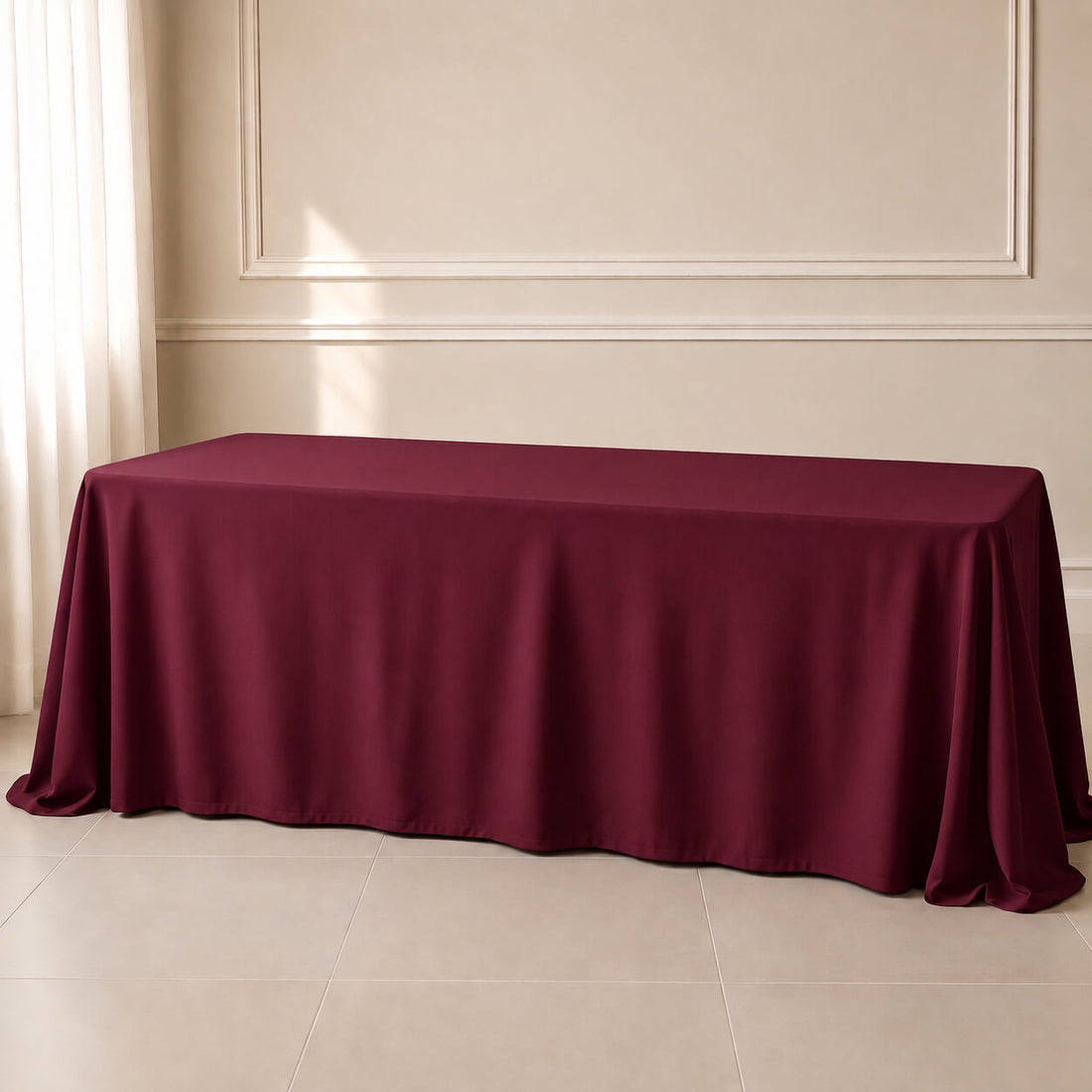 Burgundy polyester rectangle tablecloth 90"x156" with seamless finish.