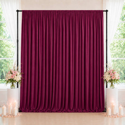Burgundy velvet backdrop with floral candle wedding decor and window curtains