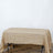 Natural burlap tablecloth on a wooden floor