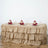 Burlap table skirt with ruffled design for elegant dining setups.