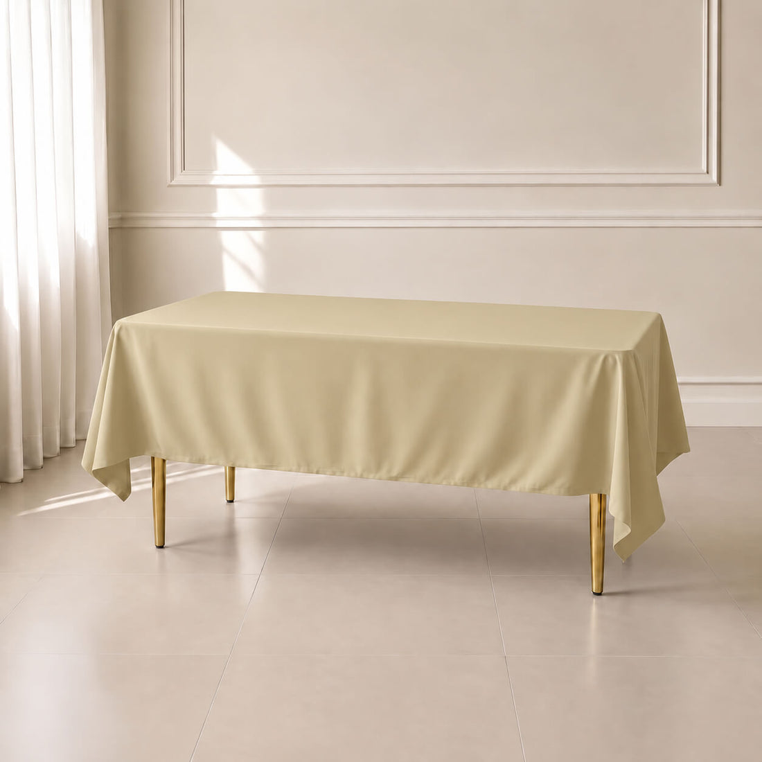 champagne rectangle tablecloth on a dining table