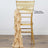Gold chiavari chair with a draped beige satin sash. Satin sash sold separately.