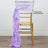 Gold chiavari chair with lavender chiffon draping and satin sash sold separately.