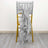 Gray ruffled chair cover draped over a yellow chair.