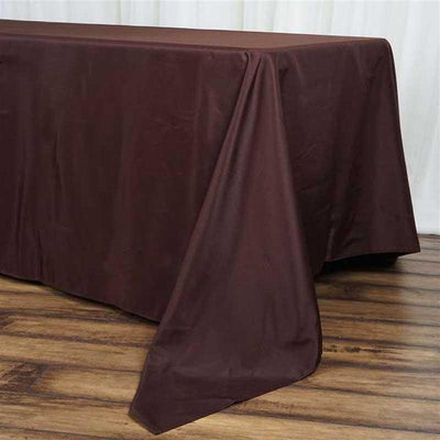Brown tablecloth draped elegantly over a wooden table.