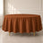 Cinnamon brown round tablecloth, durable and stain-resistant for easy maintenance.