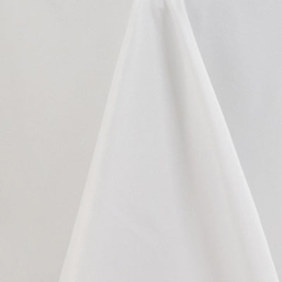 White fabric draped elegantly in a studio setting #whtbkgd